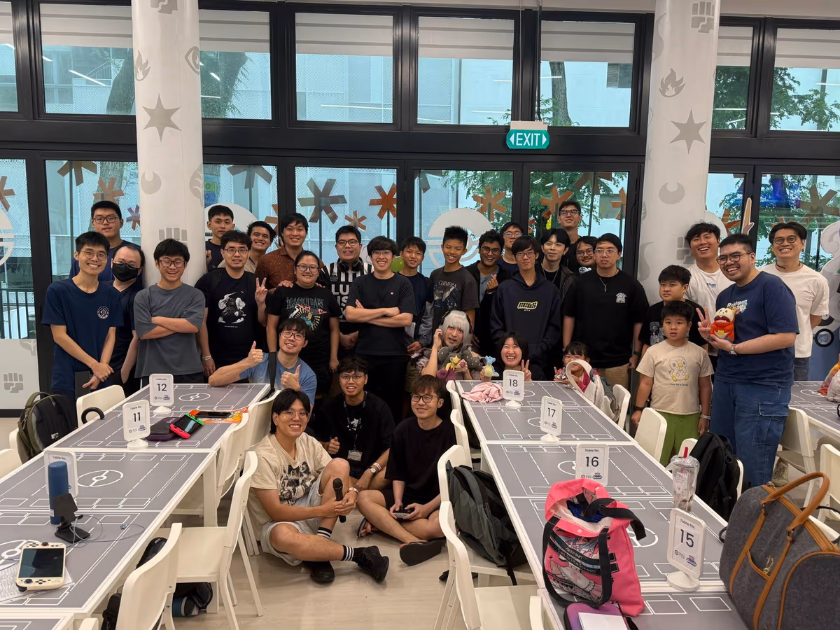 Players from The Trainer Shed community posing together at a tournament