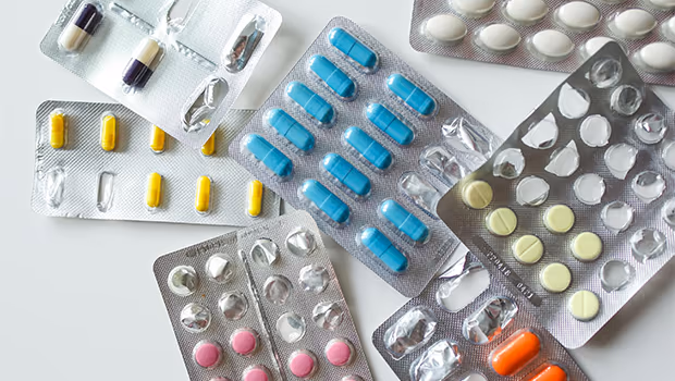 Assorted tablets and capsules in blister packs